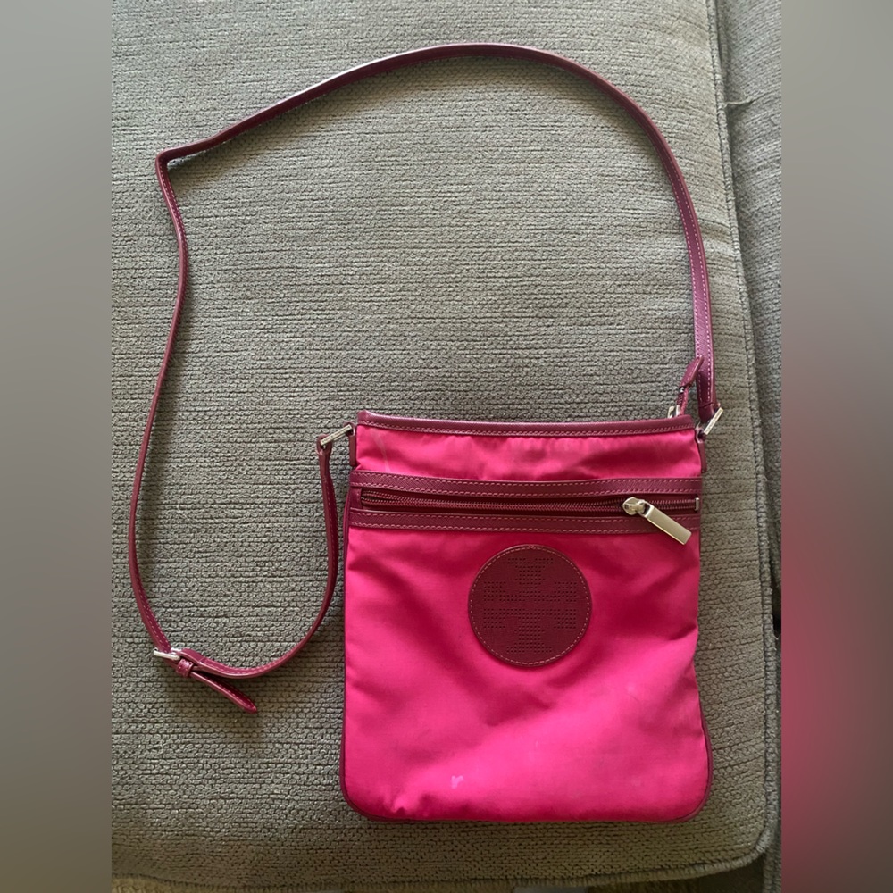 Hot pink Tory Burch purse.
